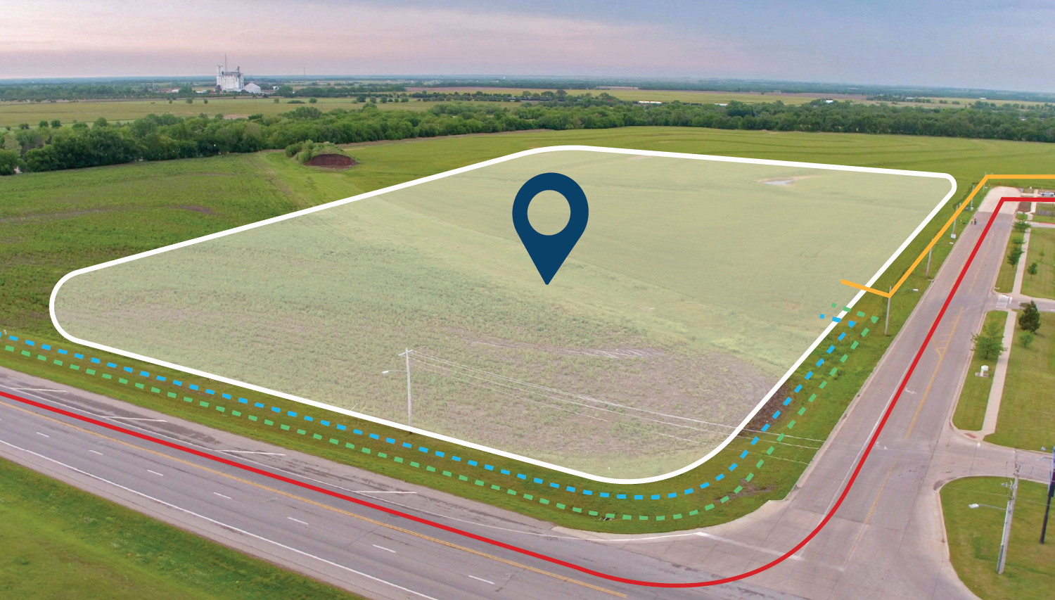 Drone image of a location with utility lines drawn around a potential build site